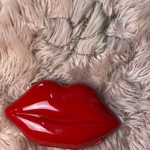 Red lips purse